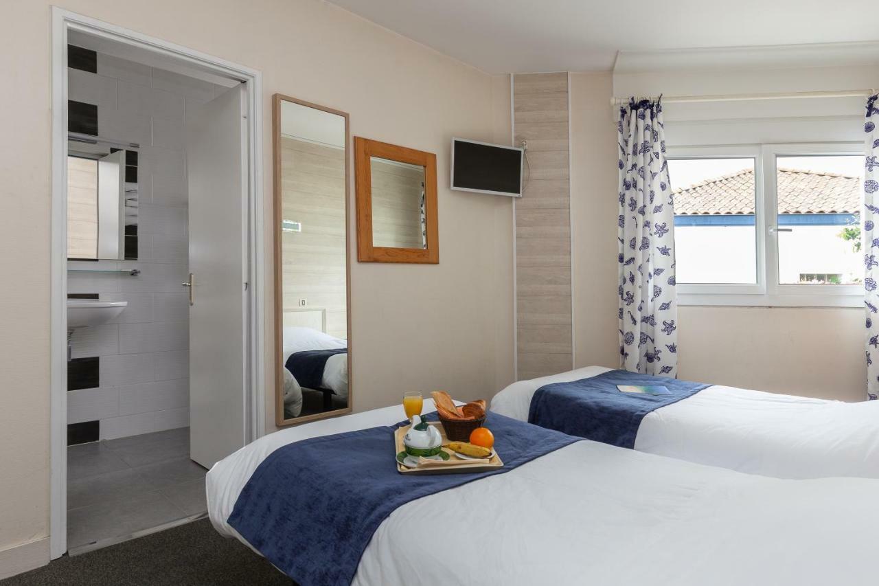 Logis Hotel Le Rond Point Soorts-Hossegor Bagian luar foto